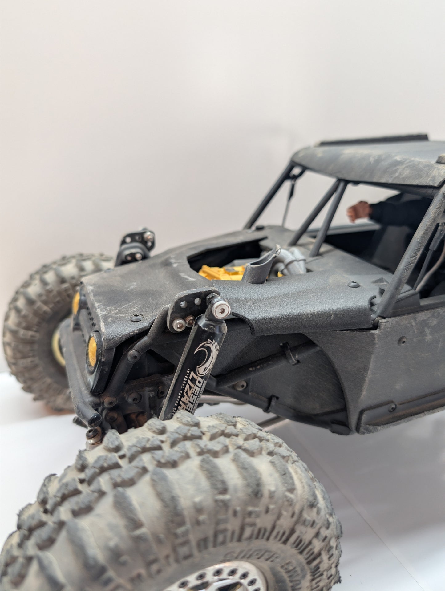 H10 Shock relocation bracket. Carbon fiber.