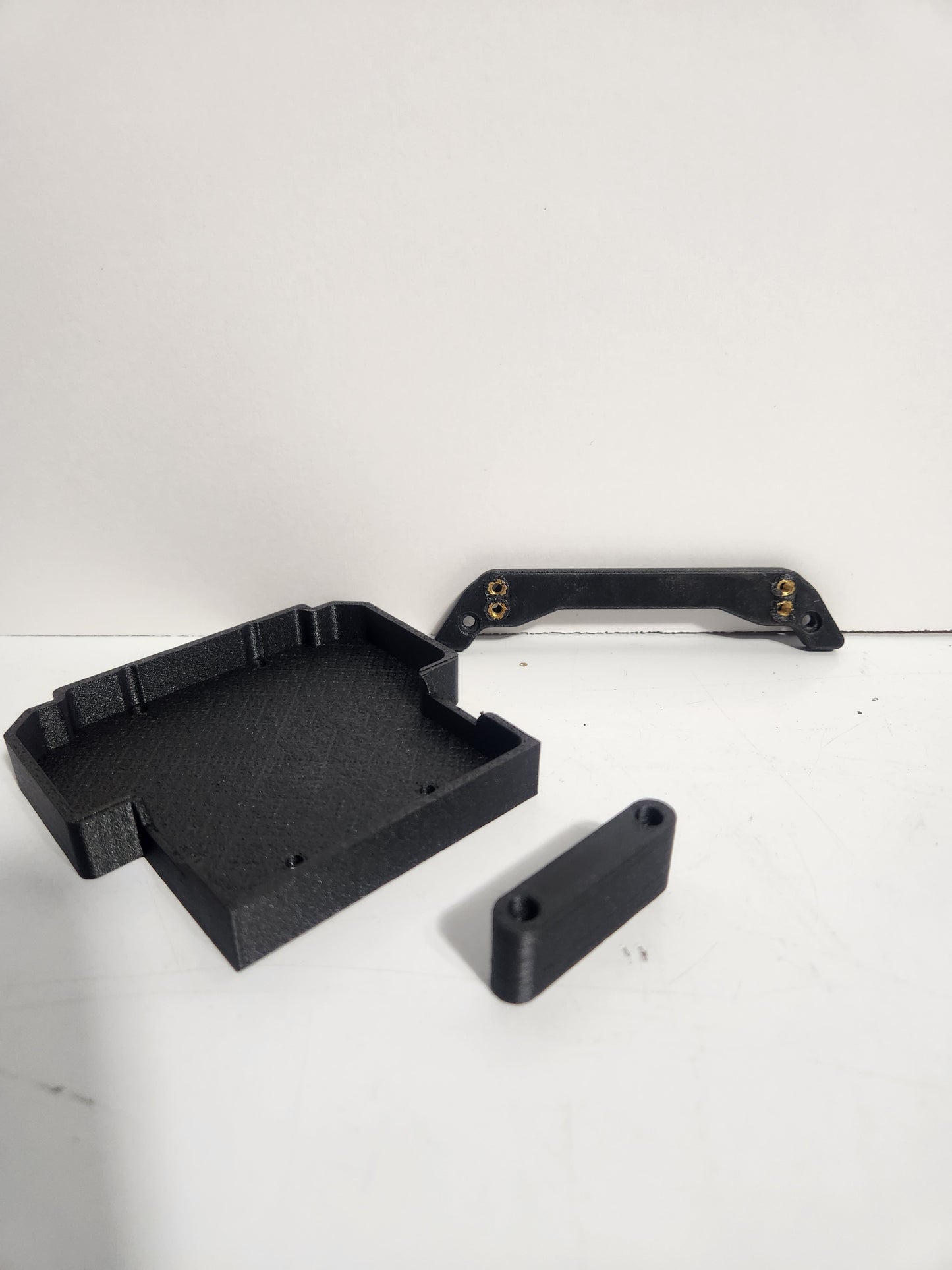 OPTIC Shock relocation bracket and bed.